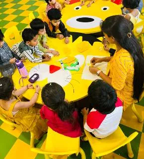 Teacher reading story to children